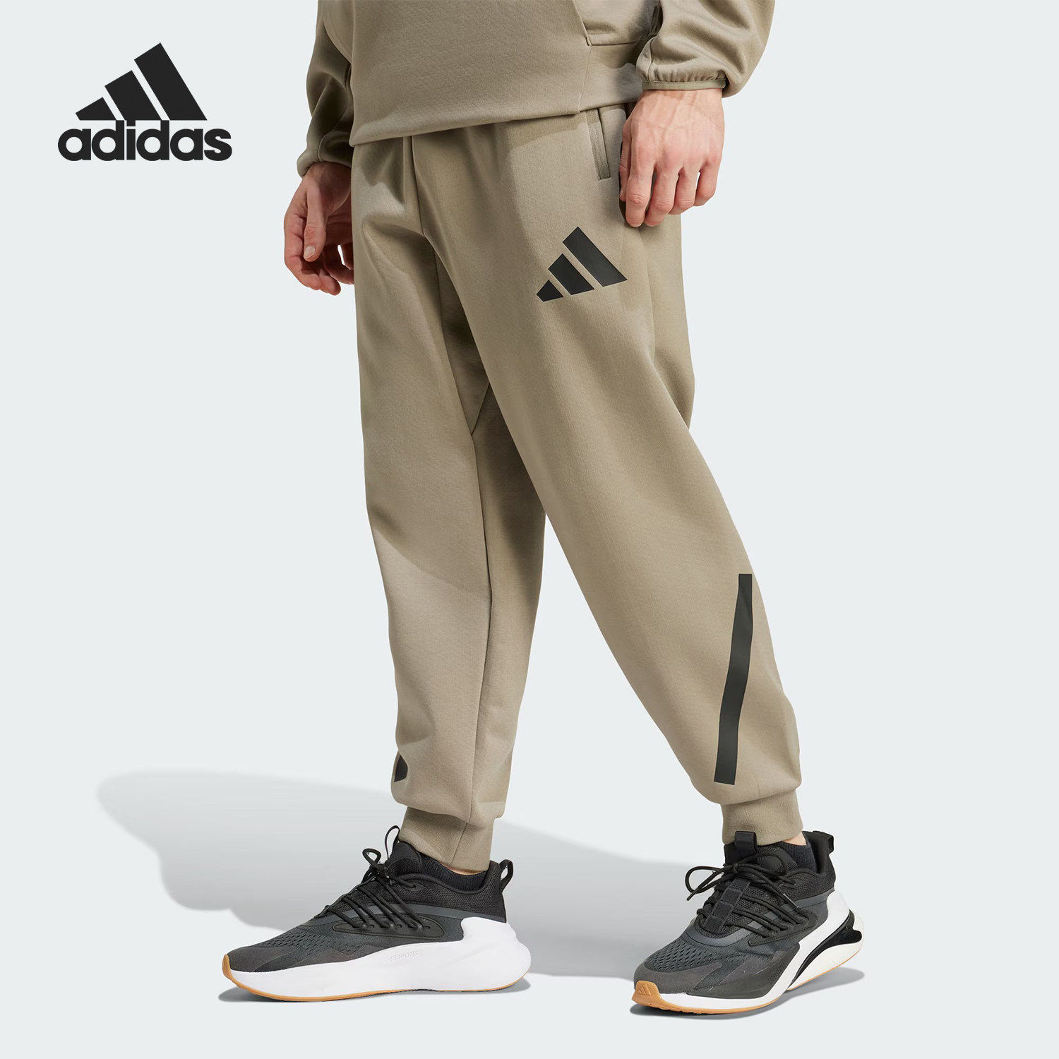 Adidas阿迪达斯新款男士复古训练宽松针织休闲束脚运动长裤JE3072