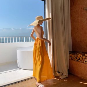三亚海边度假沙滩裙超仙黄色