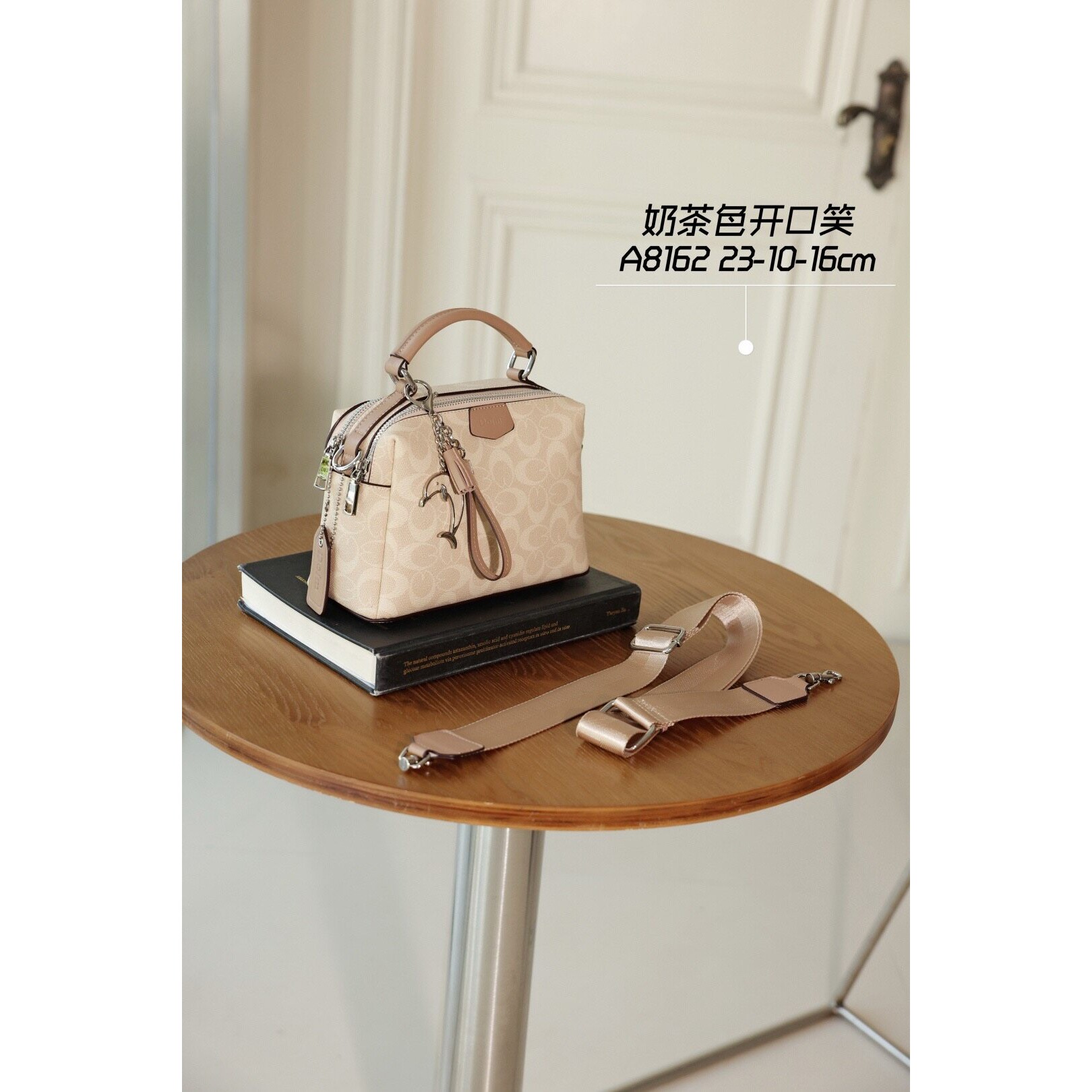 优草坊品牌正品包包女包2026新款蝴蝶水桶包奶茶色高级轻奢时尚单