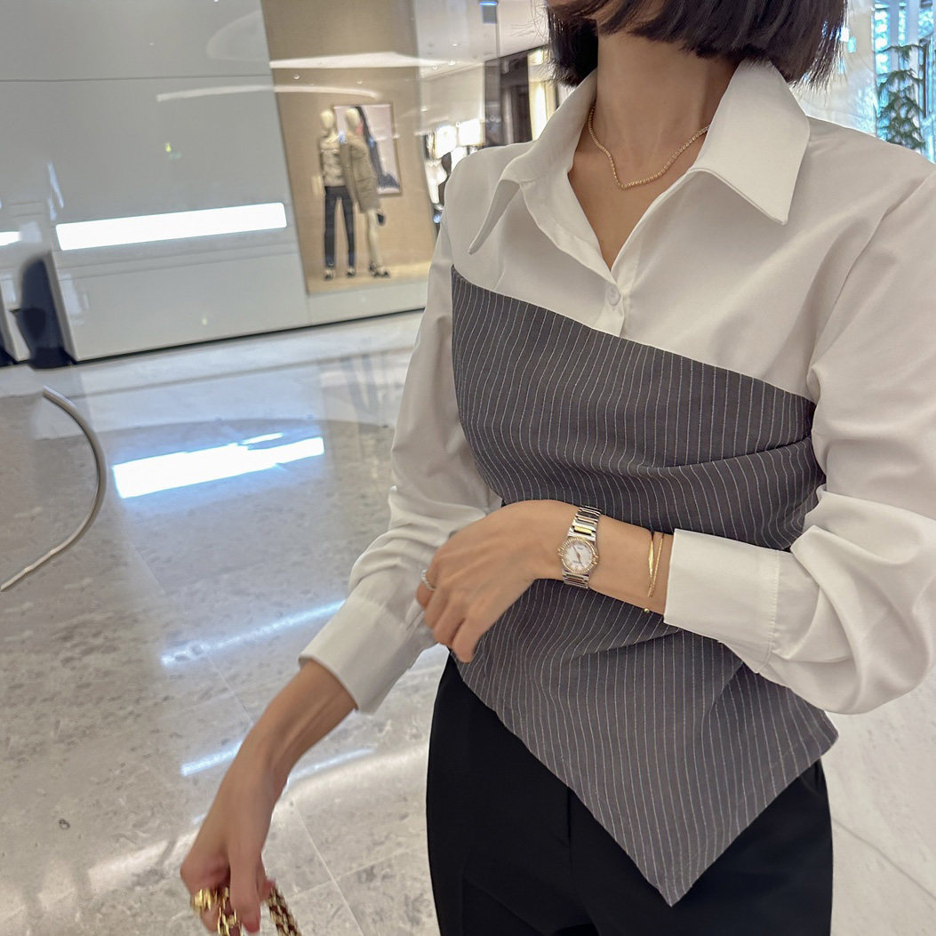 韩国东大门2025春装气质翻领撞色假两件拼接不规则条纹长袖衬衫女