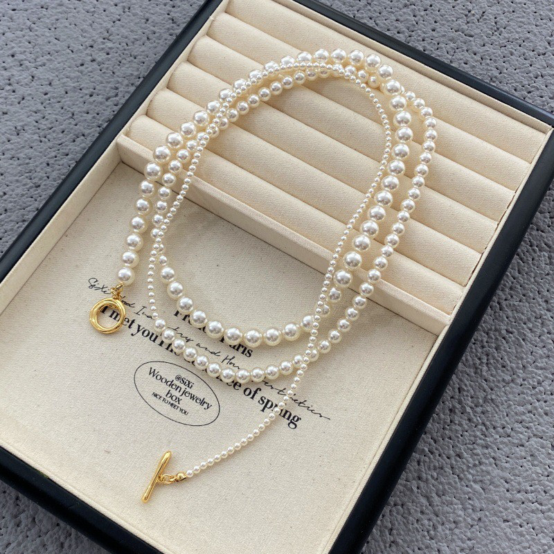 一款多戴长款渐变珍珠项链女法式轻奢小众设计高级长款OT扣毛衣链