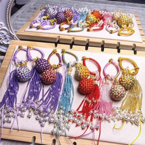 手工编织有(球)必应转运球包挂饰品挂件百搭景区流通时尚流苏包挂