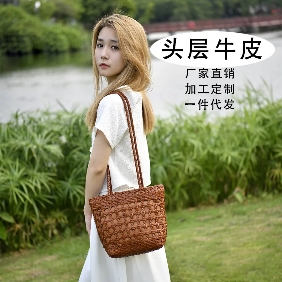 2023秋冬新款头层牛皮单肩包真皮复古手工编织包镂空森系女包