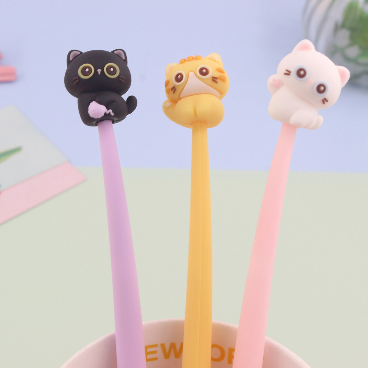 可奇家可爱猫咪硅胶摇摇中性笔学生减压卡通0.5黑水笔创意碳素笔