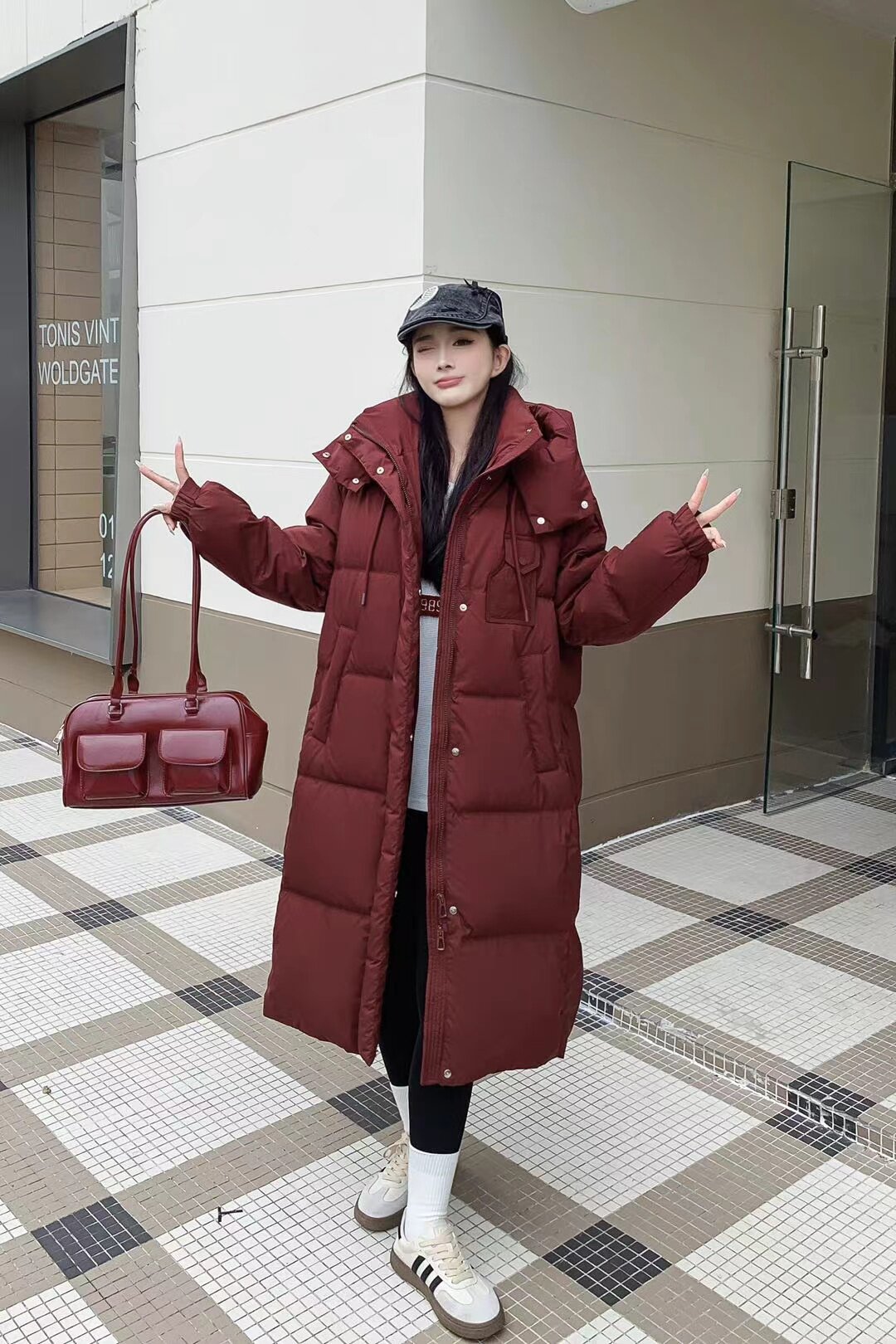 大码加大加厚2025年冬季新款宽松连帽外套羽绒服女过膝保暖加长潮