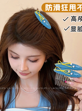 蓝色底蝴蝶结闪钻发梳发夹女