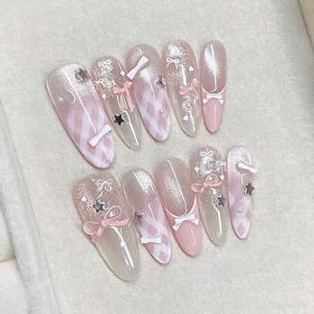 薄粉星星蝴蝶结猫眼手工穿戴甲