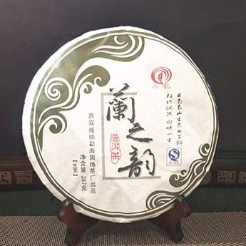 2012年国艳 兰之韵景迈兰香早春乔木饼357克陈年干仓云南普洱生茶