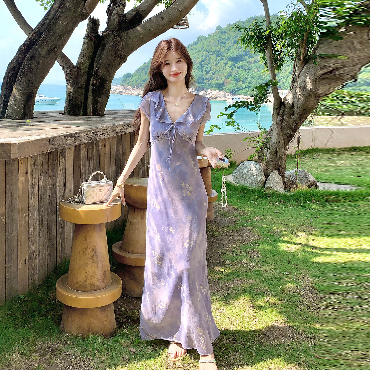 紫色法式浪漫度假风荷叶边连衣裙2026新款夏日掐腰显瘦气质碎花裙