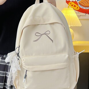 大学生双肩包初中生电脑包韩版简约少女蝴蝶结书包大容量背包女