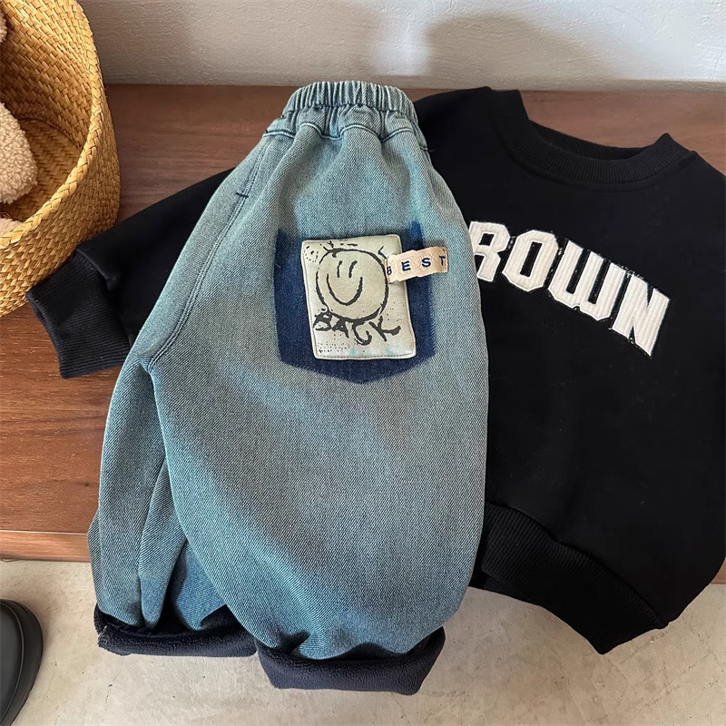 儿童牛仔裤2025冬男女童一体绒宽松哈伦帅气牛仔裤宝宝加厚长裤