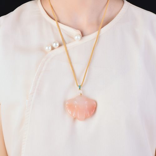 天然金丝玉桃花酿大象玉挂件