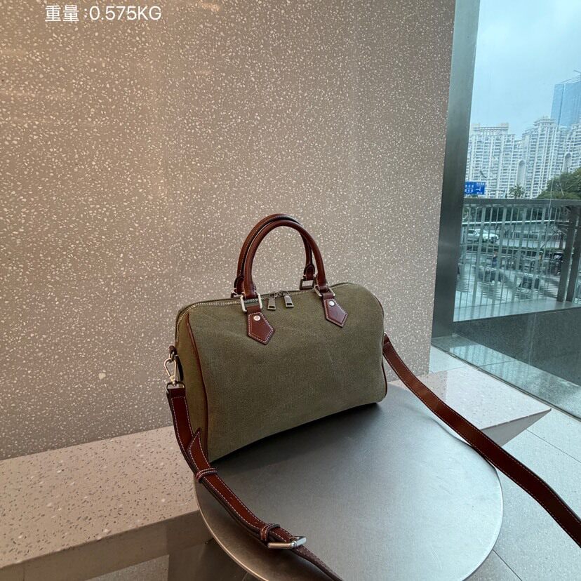 包包女2026新款网红撞色复古牛皮枕头包帆布波士顿手提单肩斜挎包
