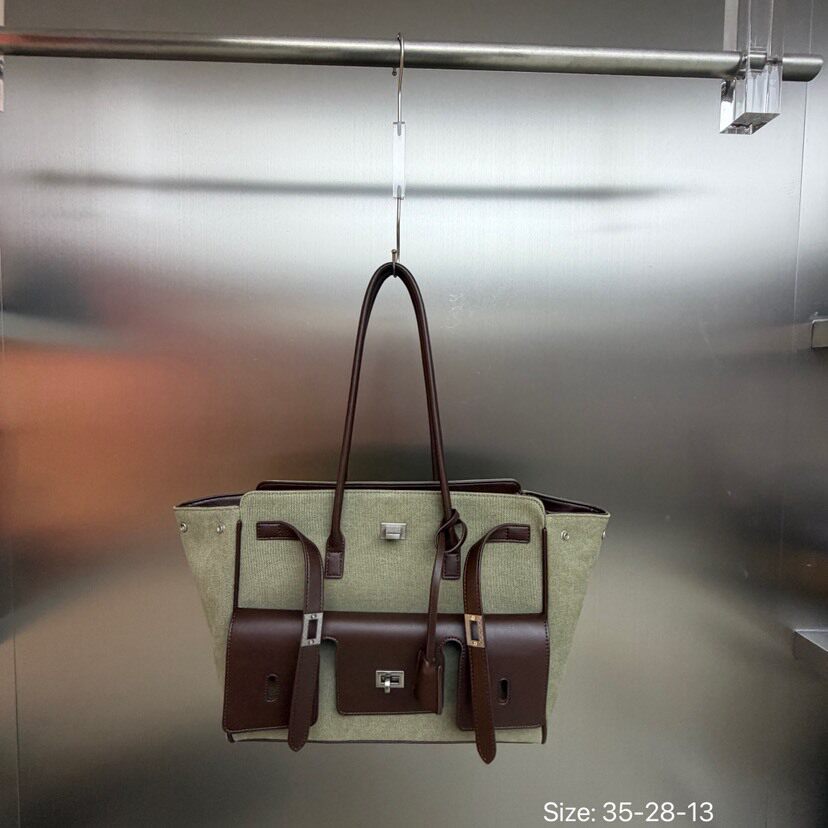 包包女2026新款网红撞色复古锁扣翅膀包大容量中性机车托特单肩包