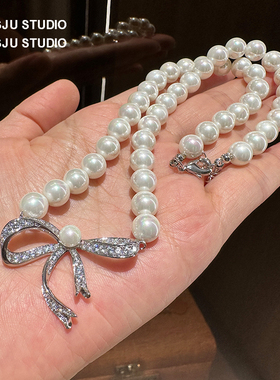 琚小姐蝴蝶结镶钻白色珍珠项链