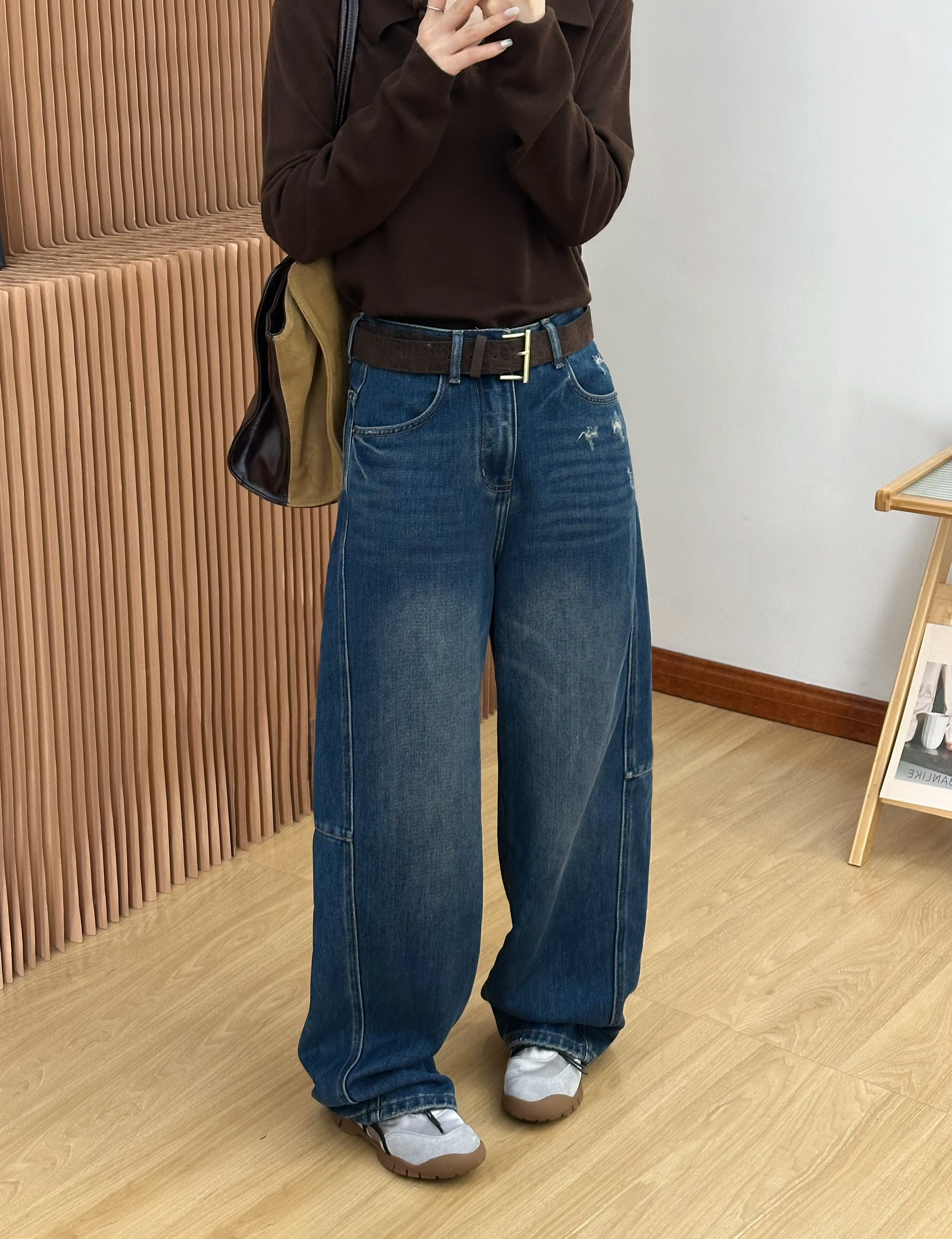 欧洲站2025秋冬新款内磨毛保暖牛仔弯刀裤女洋气磨破宽松显瘦长裤
