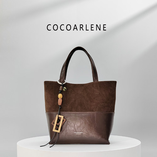 cocoarlene包包新款磨砂皮水桶包时尚百搭复古小众手提斜挎包2389