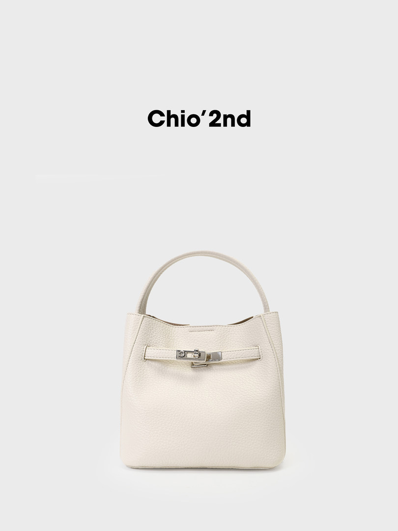 Cream leather handbag with top handle and buckle detail