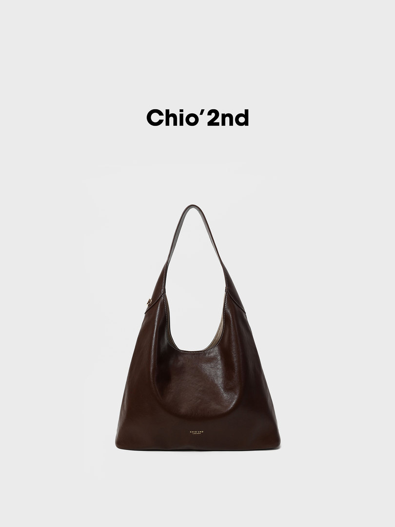 Dark brown leather shoulder bag on a white background