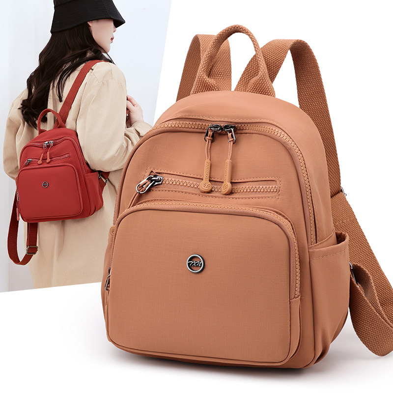 2026新款女士双肩包迷你多层休闲通勤包轻便旅行背包牛津布女包