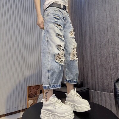 新款时尚九分破洞老爹牛仔裤女