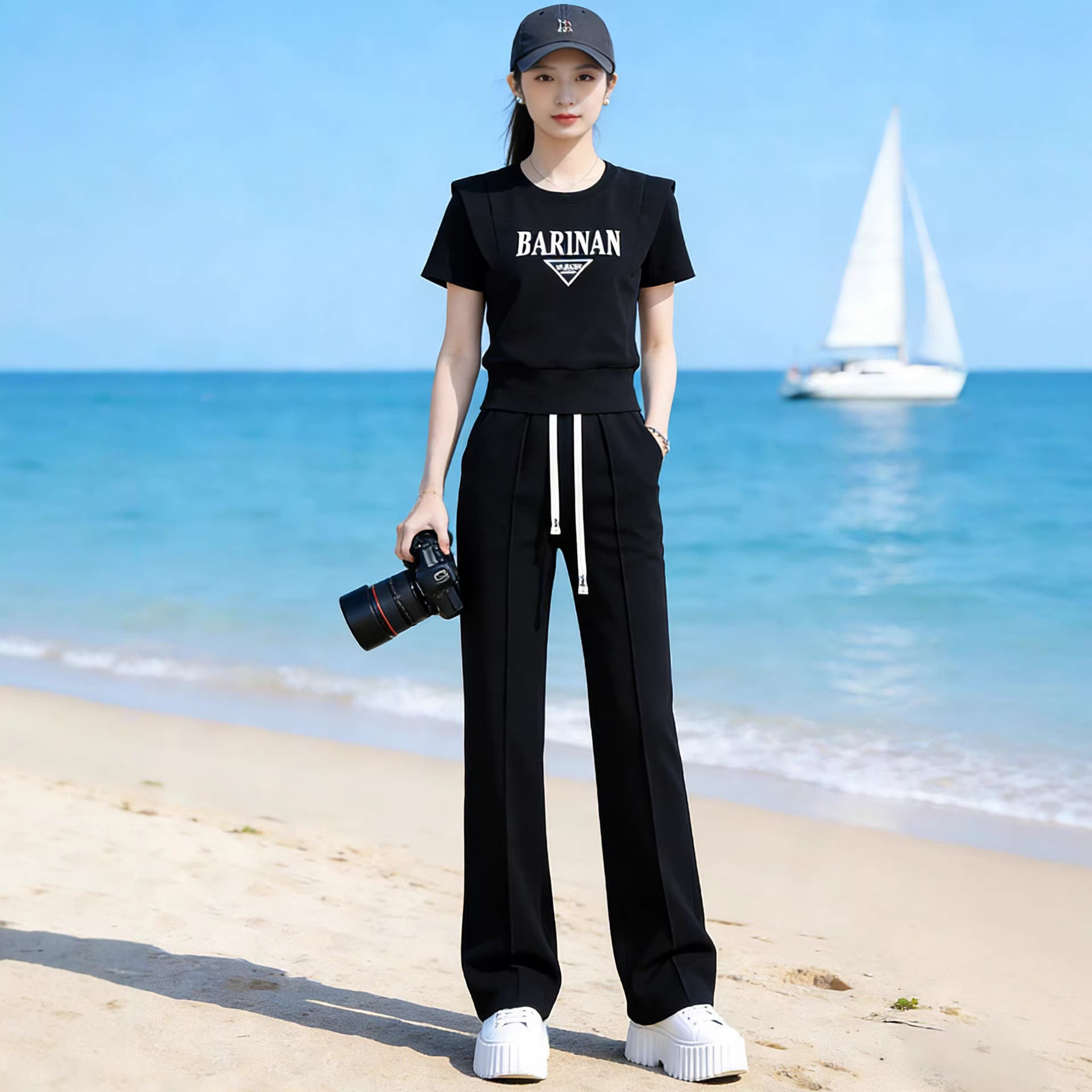 高级感休闲运动套装女夏季时髦显瘦欧货短款上衣直筒裤薄款两件套