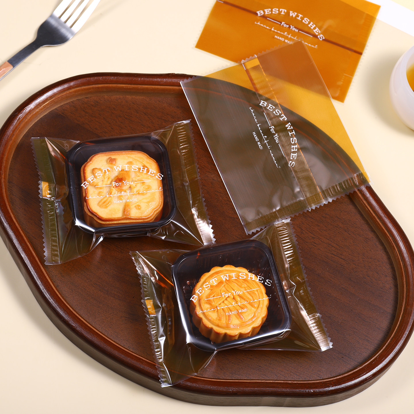 咖啡色月饼包装袋机封带底托