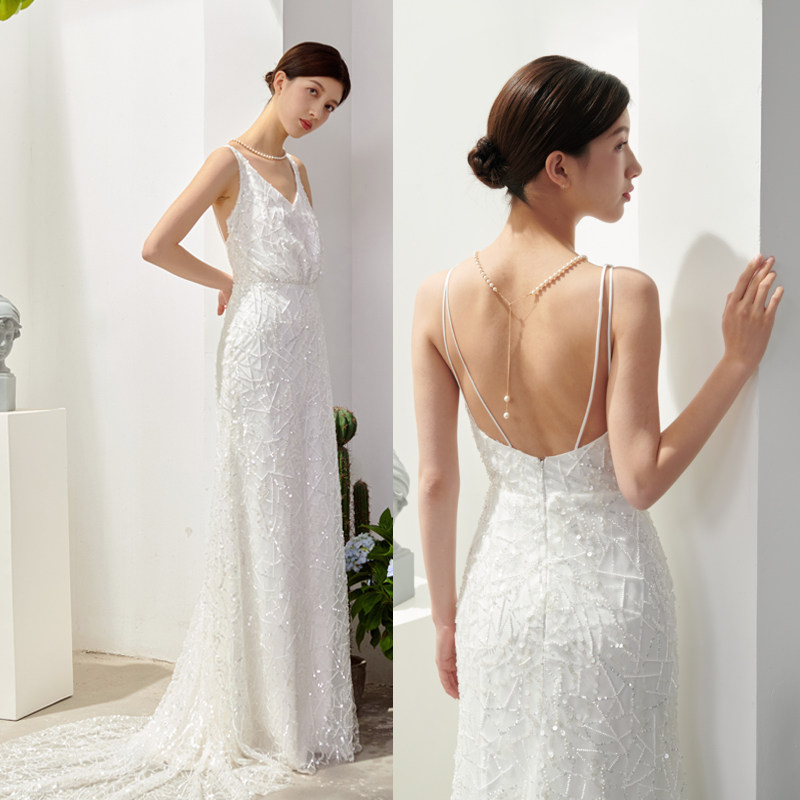 优罗莎原创露背吊带亮片鱼尾气质款白色晚装甜美新娘户外草坪婚纱