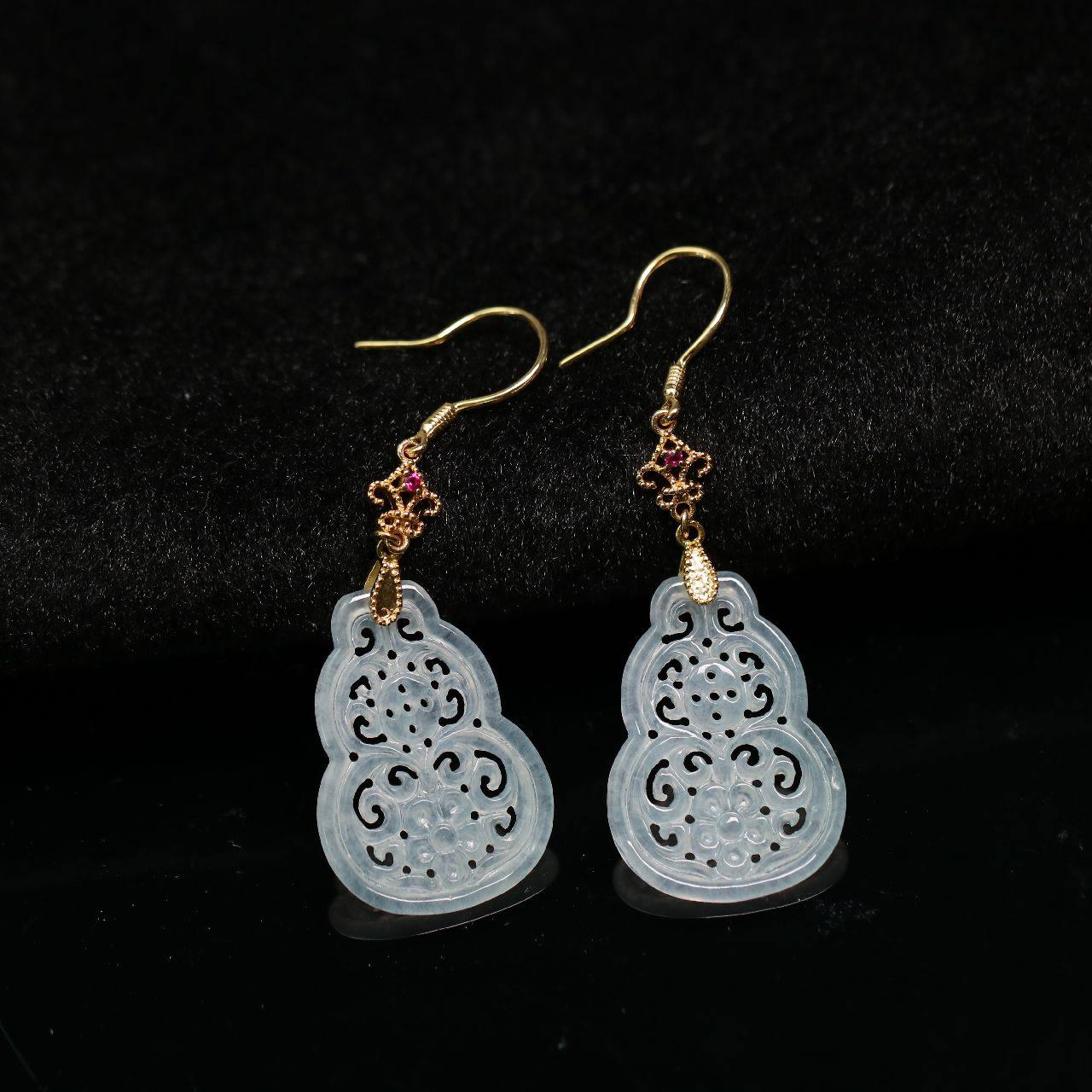 #1268一对18K金加红宝镶嵌白色冰