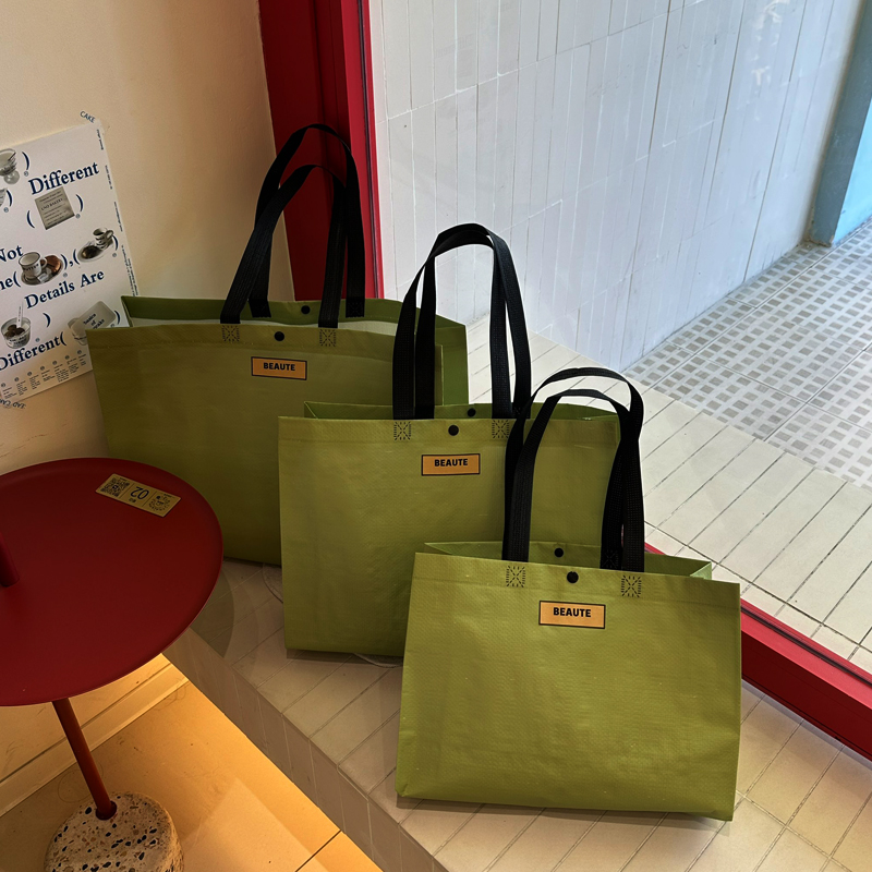 抹茶色编织袋服装店无纺布手提袋