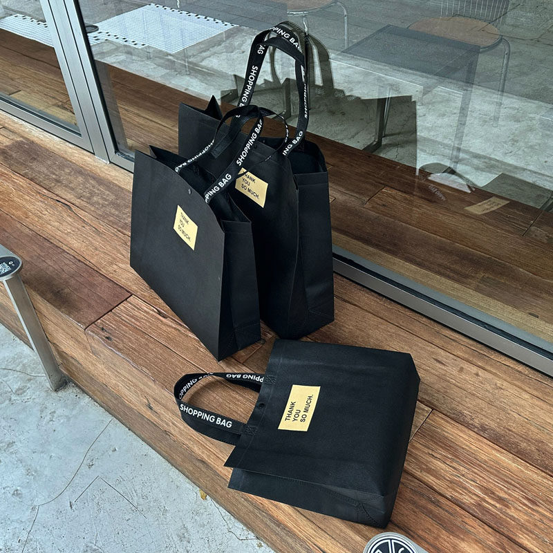 黑色加宽无纺布手提袋服装店购物袋定制logo手提袋礼品袋带暗扣