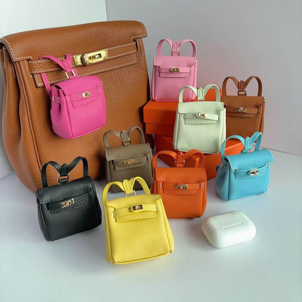 新款超纤双肩小背包包挂件创意耳机包时尚车挂饰可爱迷你小背包女