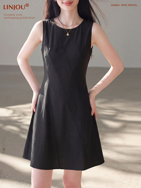 Black sleeveless A-line dress worn by a model