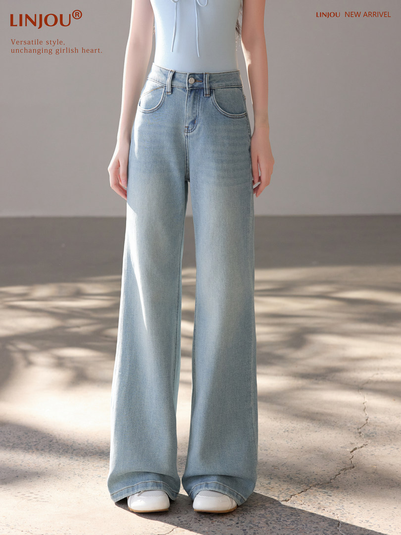 Light wash wide-leg jeans worn by a model