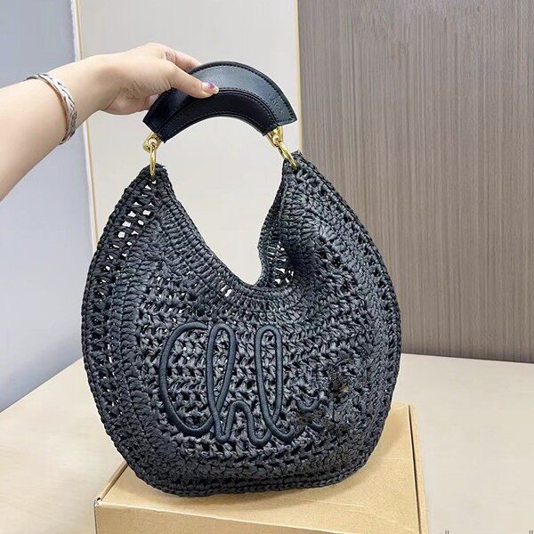 跨境波西米亚草编沙滩包小众设计新月包纤薄金属把镂空腋下包手工