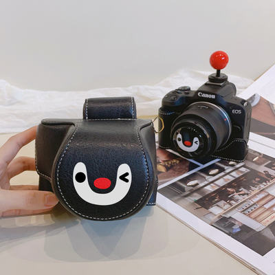 企鹅皮套r50相机包ZVE10保护套