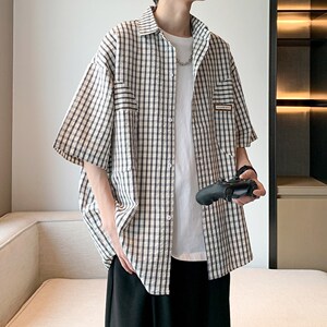 港风潮男衬衣 千鸟格子宽松大码短袖衬衫 酒店内景 6610 P45控58图片