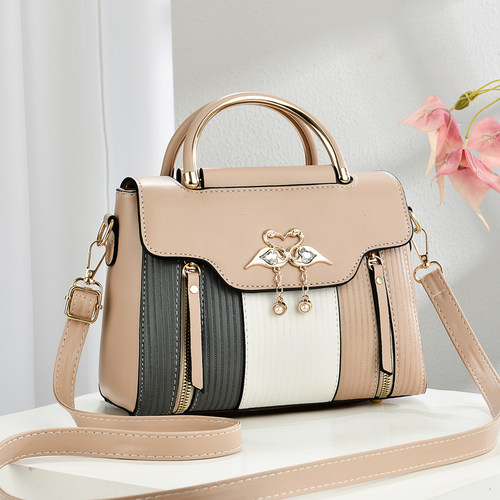 拼色手提包女2025新款时尚百搭潮流高级感通勤网红单肩斜挎包女