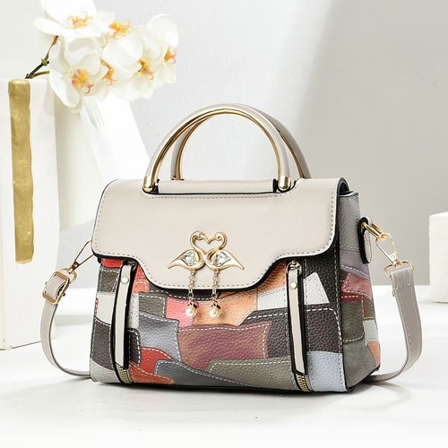 女士手提包2025新款高级感撞色轻奢拼色网红通勤单肩斜挎包小方包