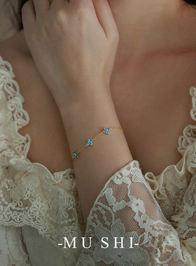 S925纯银镀18K金蓝锆石花朵手链