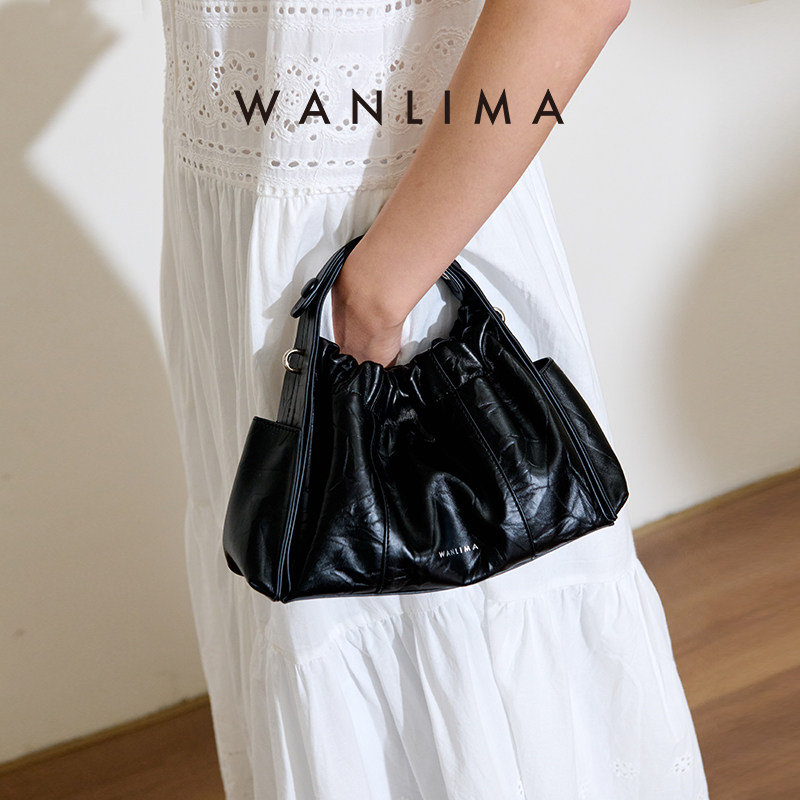 万里马手抓纹真皮云朵包包女士2026新款手提三角包超火上班小拎包