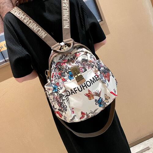 达芙世家旅行双肩包时尚轻便旅游