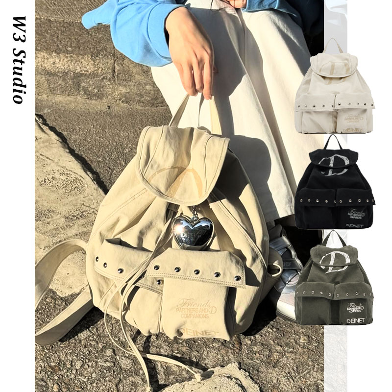韩国Deinet抽绳帆布多口袋双肩包大容量铆钉学生党书包小众街头风