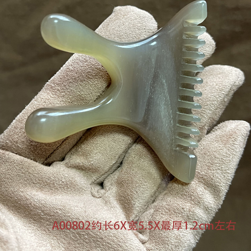 面部刮痧点穴美容天然牛角