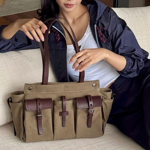 拉达新品多口袋托特包欧美时尚大容量route bag帆布拼牛皮邮差包