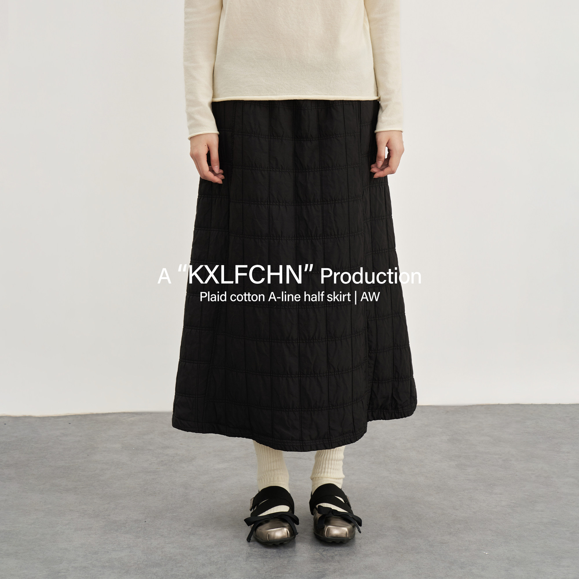 KXLFCHN空穴来风  秋冬绗缝格纹夹棉A字高腰大摆长款保暖半身裙女