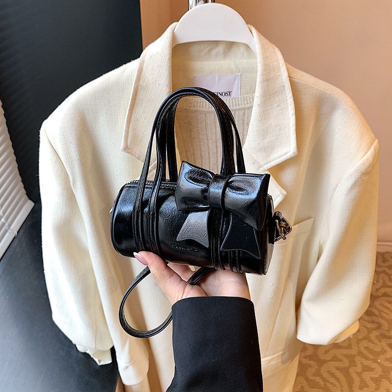 新款高级感PU儿童公主小童女童精致配饰包蝴蝶结单肩枕头包斜挎包