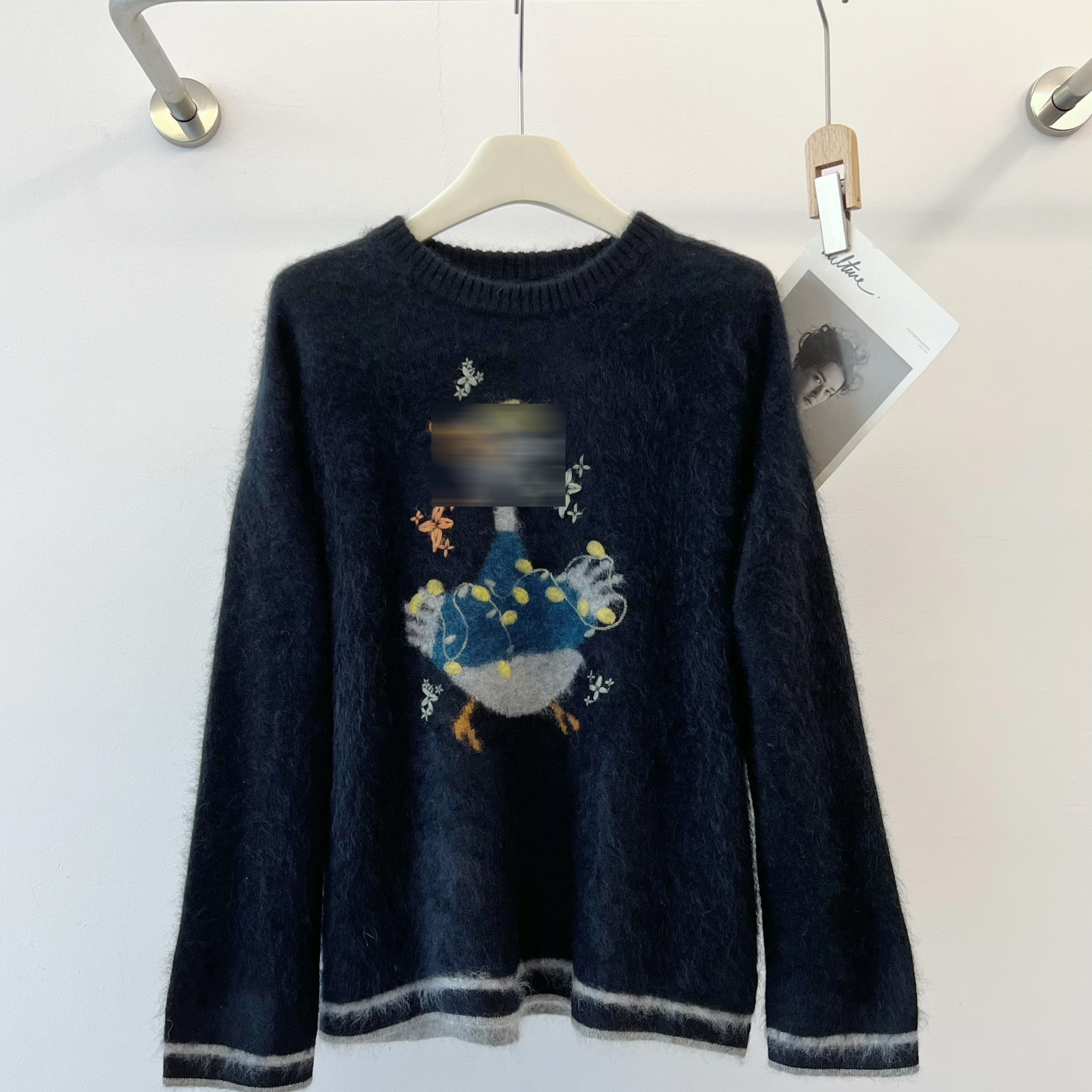 黑色印花圆领提花针织衫