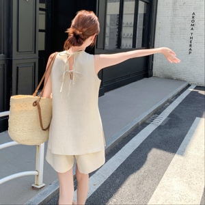 好久小众穿搭老钱风米白色无袖套装女夏季超火好看马甲短裤两件套图片
