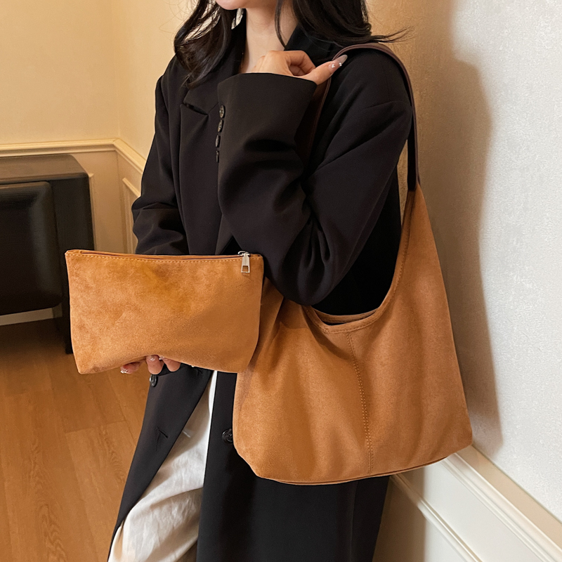红鹮鸟百搭通勤腋下包包女2025秋冬时尚复古单肩包小众软PU